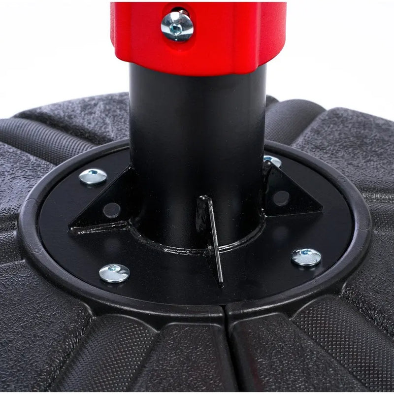Freestanding punching bag return